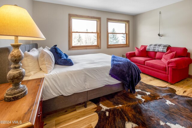 bedroom featuring light wood-type flooring