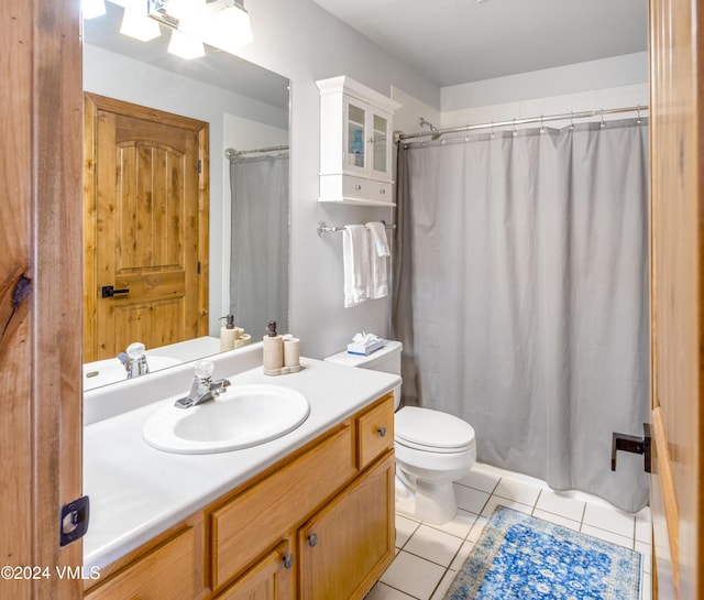 405 Greenwaye Cir Unit 11-A, Eagle-Vail, CO 81620 - full bathroom with tile patterned flooring, vanity, and a shower with curtain