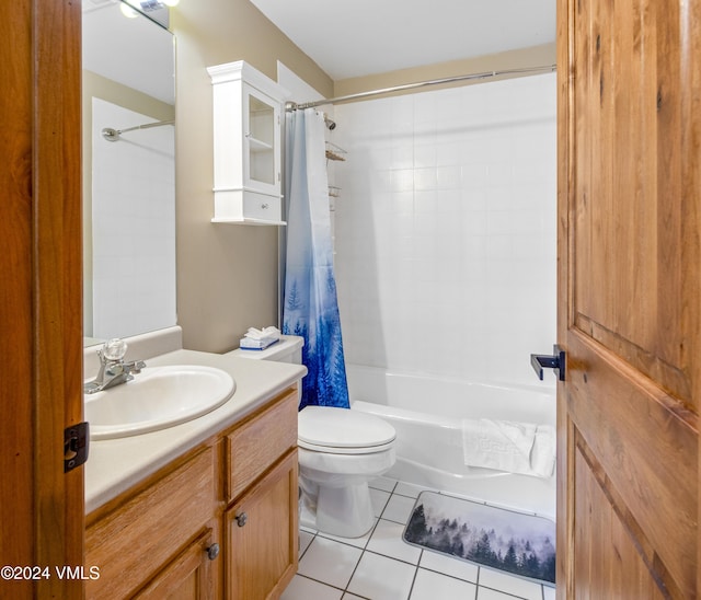 full bathroom with vanity, shower / tub combo with curtain, tile patterned floors, and toilet