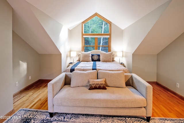405 Greenwaye Cir Unit 11-A, Eagle-Vail, CO 81620 - bedroom with vaulted ceiling and wood finished floors