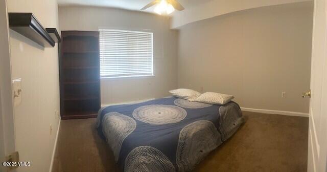 1902 Crazy Horse Cir, Edwards, CO 81632 - carpeted bedroom with ceiling fan and baseboards