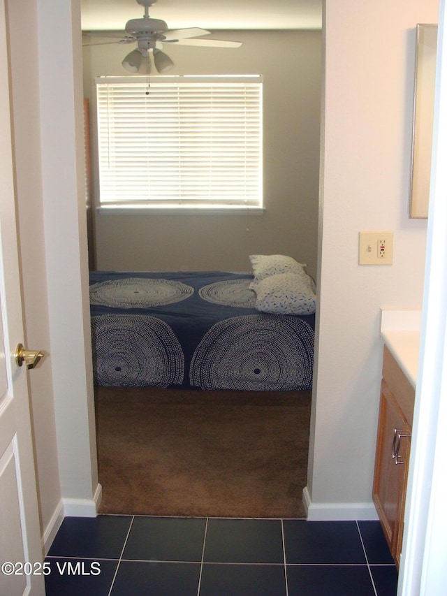 1902 Crazy Horse Cir, Edwards, CO 81632 - interior space with multiple windows, dark colored carpet, and dark tile patterned flooring