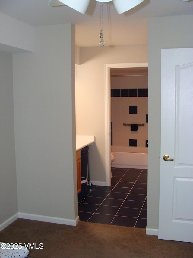 1902 Crazy Horse Cir, Edwards, CO 81632 - bathroom with tile patterned floors, a washtub, toilet, vanity, and walk in shower