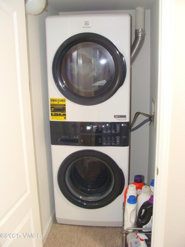 1902 Crazy Horse Cir, Edwards, CO 81632 - washroom featuring stacked washer and clothes dryer
