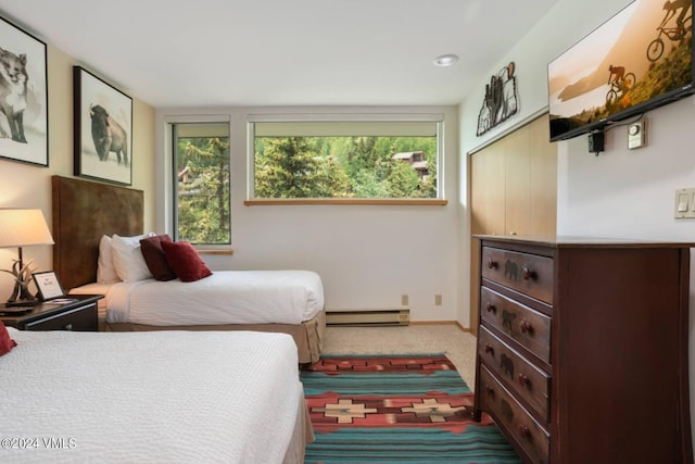 1100 N Frontage Rd Unit 1519, Vail, CO 81657 - carpeted bedroom with baseboard heating and multiple windows