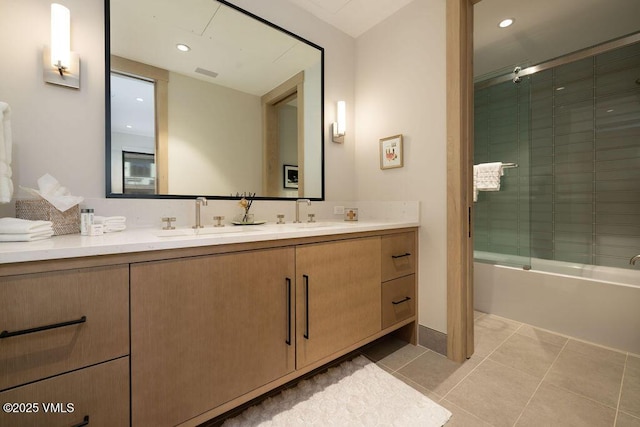 42 Riverfront Ln Unit Th-13, Avon, CO 81620 - full bath featuring double vanity, shower / bath combination with glass door, tile patterned floors, and recessed lighting