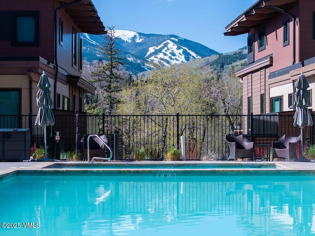 42 Riverfront Ln Unit Th-13, Avon, CO 81620 - view of pool featuring a mountain view