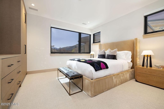 42 Riverfront Ln Unit Th-13, Avon, CO 81620 - carpeted bedroom with multiple windows, baseboards, and recessed lighting