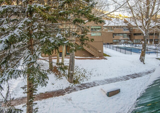 view of yard covered in snow