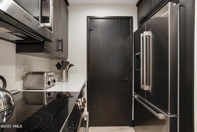 120 Offerson Rd Unit 7320, Beaver Creek, CO 81620 - kitchen with high end fridge and light countertops