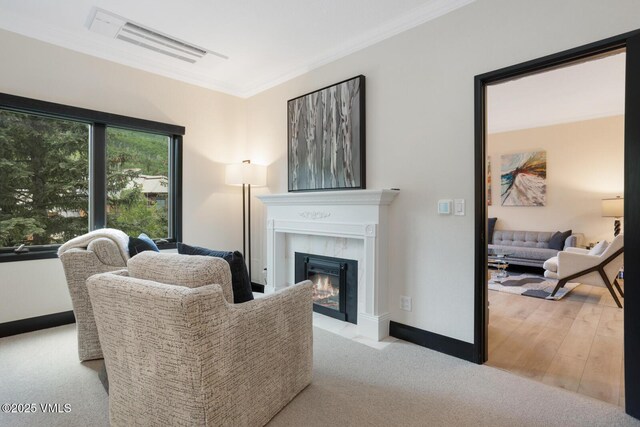 120 Offerson Rd Unit 7320, Beaver Creek, CO 81620 - carpeted living area with ornamental molding and a premium fireplace