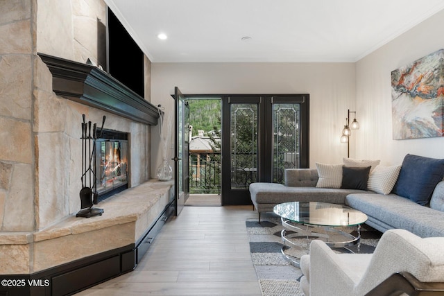 120 Offerson Rd Unit 7320, Beaver Creek, CO 81620 - living area with a multi sided fireplace, wood finished floors, crown molding, and recessed lighting