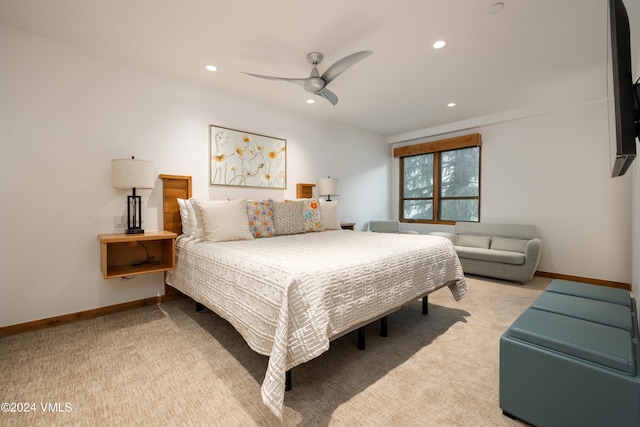 carpeted bedroom featuring ceiling fan