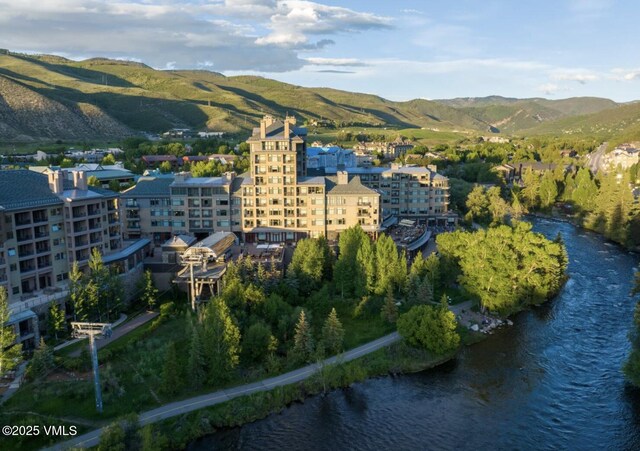 126 Riverfront Ln Unit 345, Avon, CO 81620 - aerial view of a water and mountain view