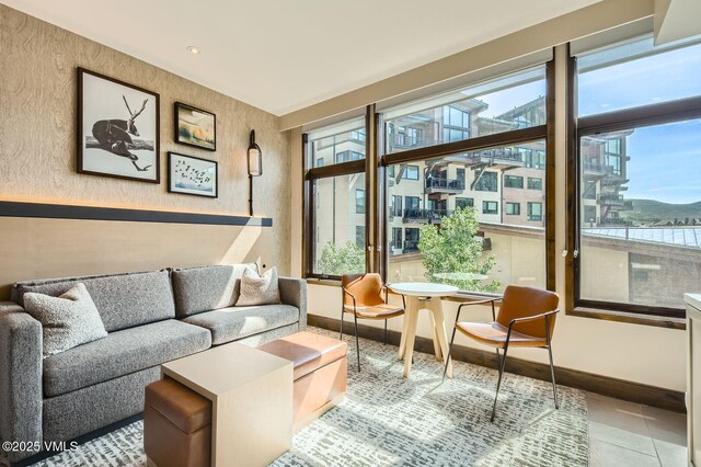 126 Riverfront Ln Unit 345, Avon, CO 81620 - living area featuring baseboards and tile patterned floors