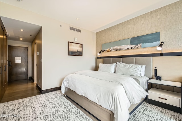 126 Riverfront Ln Unit 345, Avon, CO 81620 - bedroom with wood finished floors and recessed lighting