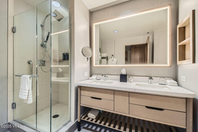 126 Riverfront Ln Unit 345, Avon, CO 81620 - bathroom featuring double vanity and a stall shower