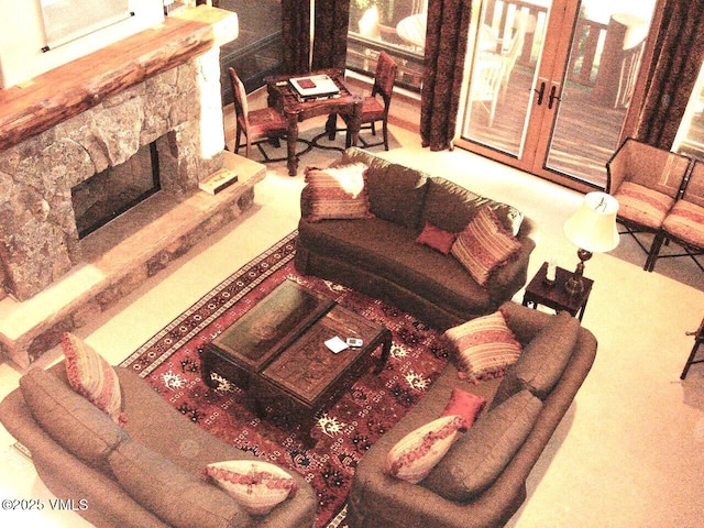 555 Charolais Cir, Edwards, CO 81632 - living area featuring carpet floors, a fireplace, and french doors