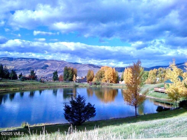 555 Charolais Cir, Edwards, CO 81632 - water view featuring a mountain backdrop