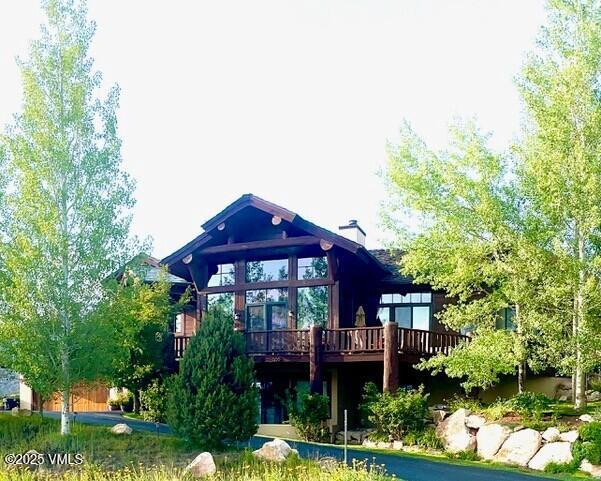 555 Charolais Cir, Edwards, CO 81632 - rear view of house featuring a deck