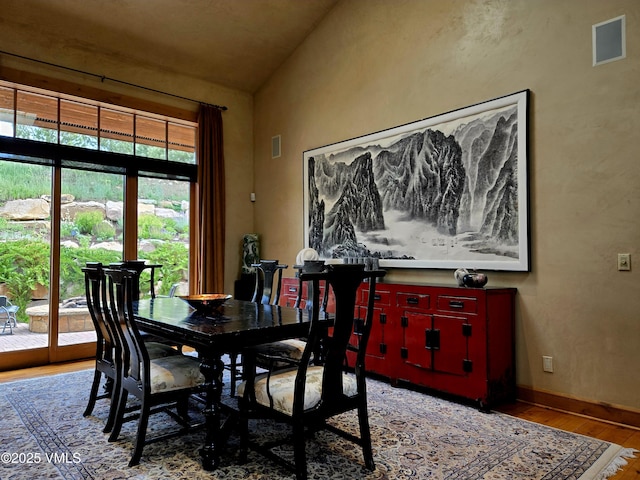 555 Charolais Cir, Edwards, CO 81632 - dining area featuring lofted ceiling and wood finished floors