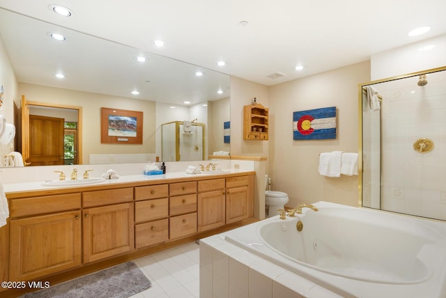 74 Cresta Rd Unit 106, Edwards, CO 81632 - full bathroom with a shower stall, double vanity, toilet, a whirlpool tub, and recessed lighting
