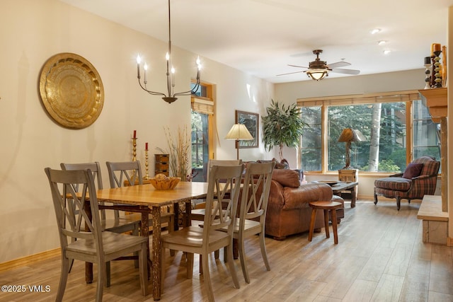 74 Cresta Rd Unit 106, Edwards, CO 81632 - dining room with a ceiling fan, light wood-style flooring, and baseboards