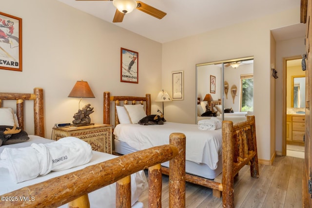 74 Cresta Rd Unit 106, Edwards, CO 81632 - bedroom with light wood-style flooring and ceiling fan