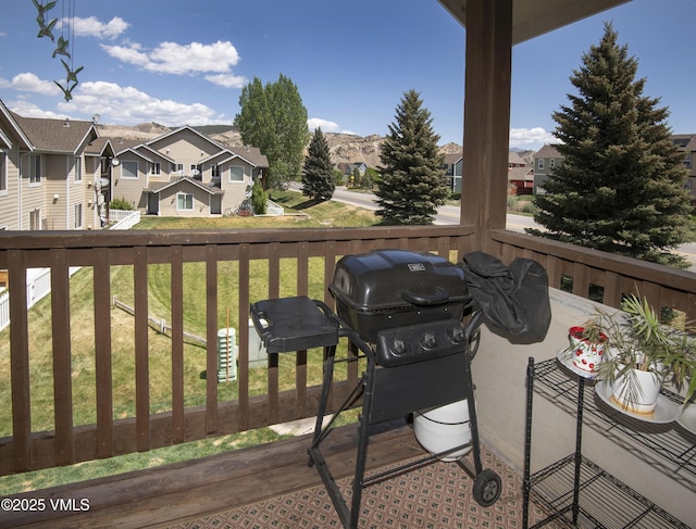 127 Jules Dr Unit D-204, Gypsum, CO 81637 - wooden terrace featuring a residential view and a lawn