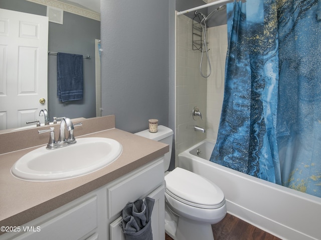 127 Jules Dr Unit D-204, Gypsum, CO 81637 - bathroom with shower / bath combo, toilet, vanity, and wood finished floors