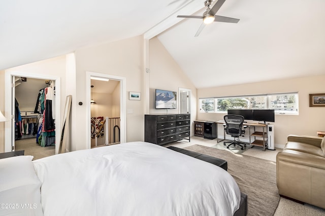 bedroom with a walk in closet, carpet floors, beam ceiling, high vaulted ceiling, and a ceiling fan