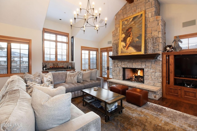 living room featuring dark hardwood / wood-style flooring, a stone fireplace, and high vaulted ceiling