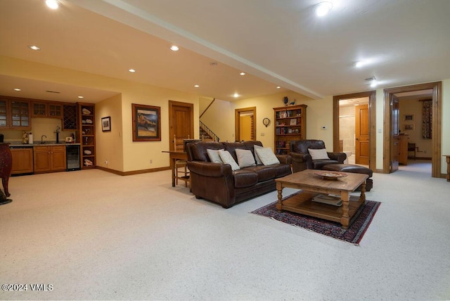 carpeted living room with wet bar and wine cooler