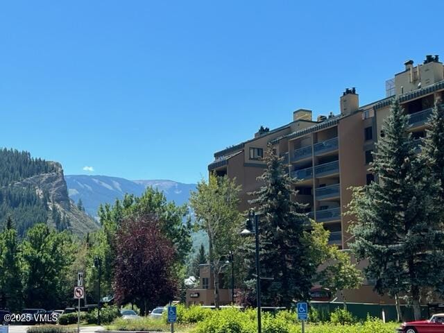 view of building exterior with a mountain view