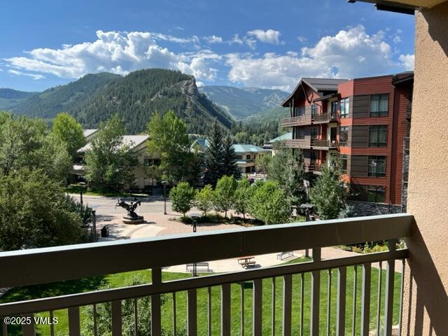 balcony featuring a mountain view