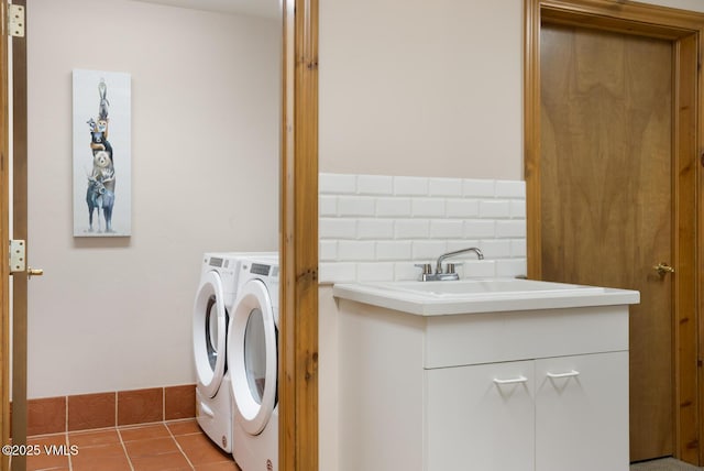 21 Hackamore Rd W, Edwards, CO 81632 - laundry room with washer and clothes dryer and light tile patterned floors
