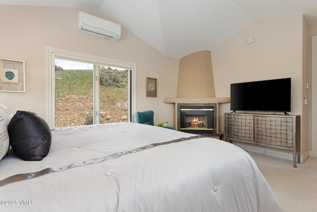 21 Hackamore Rd W, Edwards, CO 81632 - bedroom featuring an AC wall unit, lofted ceiling, carpet floors, and a large fireplace