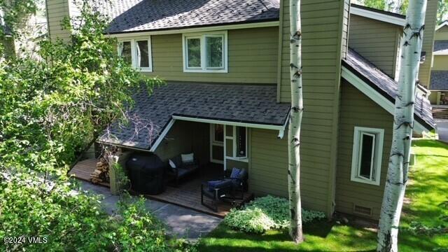570 Homestead Dr Unit 33, Edwards, CO 81632 - rear view of house featuring roof with shingles and a chimney