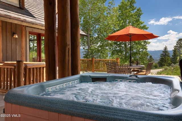 37 Hawley Ct, Edwards, CO 81632 - deck with a hot tub and a mountain view
