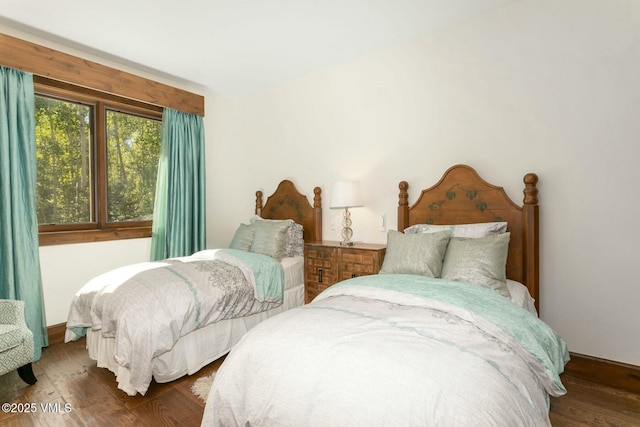 bedroom featuring wood finished floors