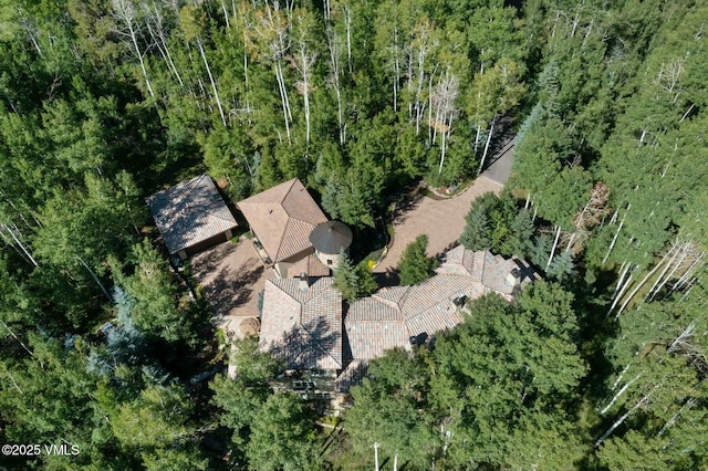 aerial view featuring a view of trees