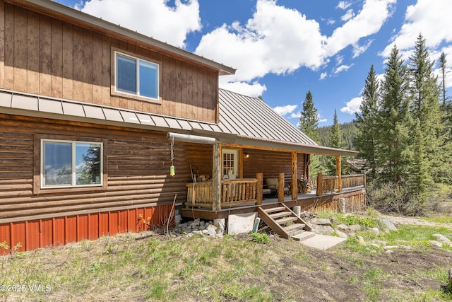 320 Mill, Eagle, CO 81631 - back of house featuring covered porch, a metal roof, and a standing seam roof