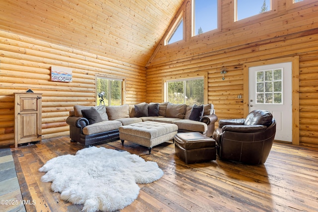 320 Mill, Eagle, CO 81631 - living area featuring high vaulted ceiling, plenty of natural light, hardwood / wood-style floors, log walls, and wood ceiling