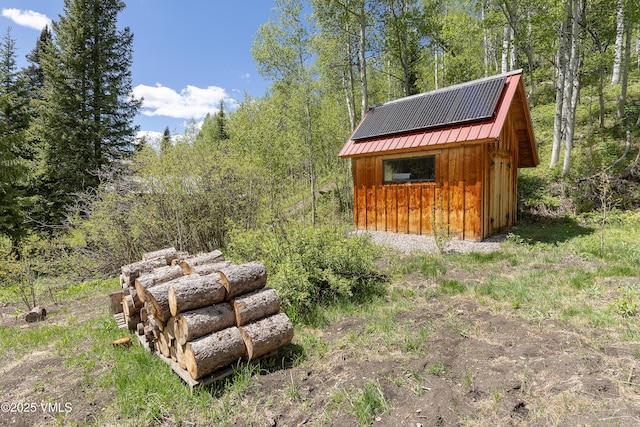 320 Mill, Eagle, CO 81631 - view of shed featuring a forest view