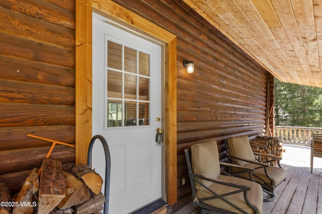 320 Mill, Eagle, CO 81631 - entrance to property featuring log siding and a porch