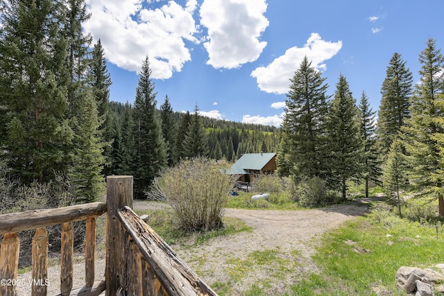 320 Mill, Eagle, CO 81631 - view of yard featuring a forest view