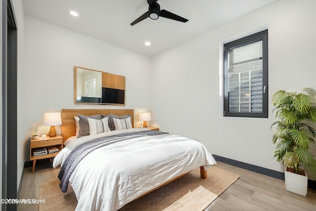 bedroom with a ceiling fan, recessed lighting, baseboards, and light wood finished floors