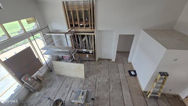 213 Harvester Ct, Eagle, CO 81631 - staircase featuring a towering ceiling and wood finished floors