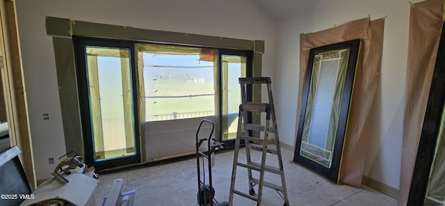 213 Harvester Ct, Eagle, CO 81631 - workout room with lofted ceiling and baseboards