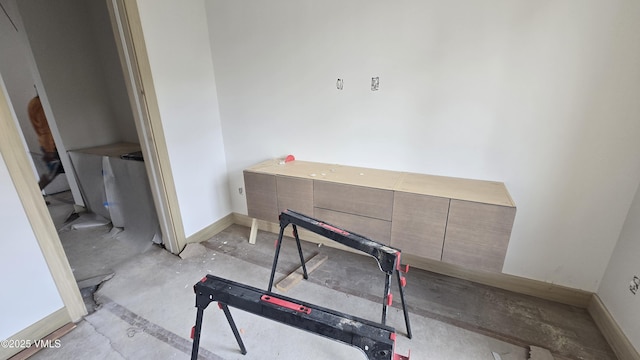213 Harvester Ct, Eagle, CO 81631 - bathroom featuring concrete flooring and baseboards